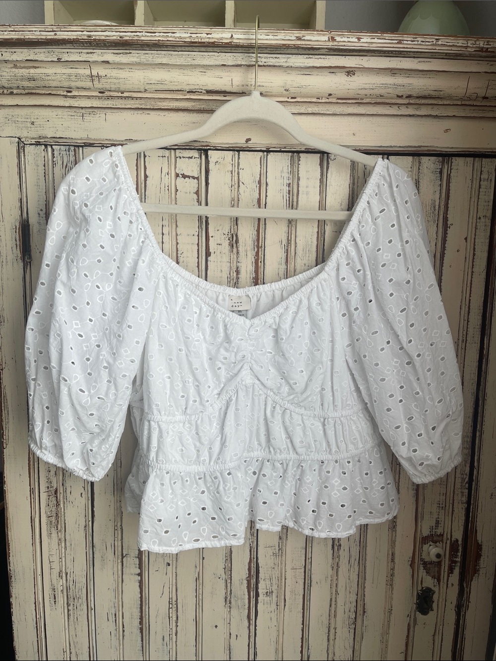White Eyelet Puff Sleeve Peplum Top